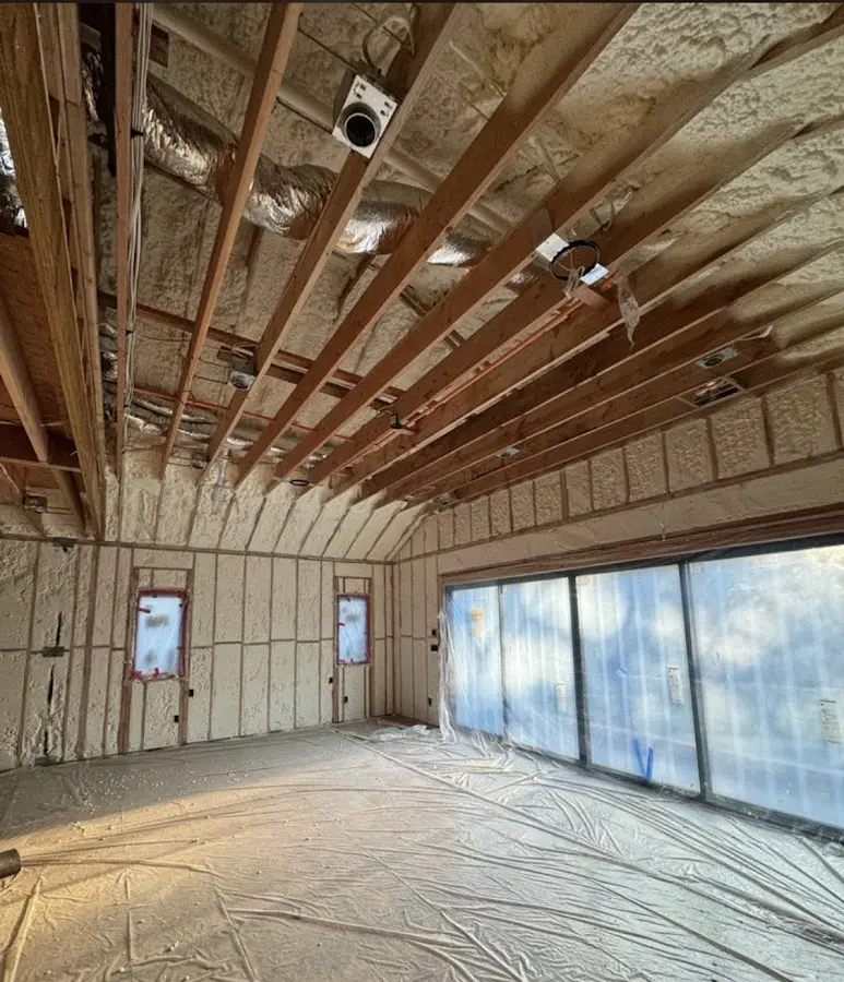 Interior walls and ceiling insulated with spray foam during new construction in Standish